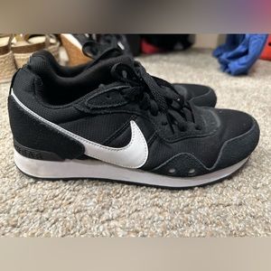 Nike black women’s running shoes. Size 8.5.